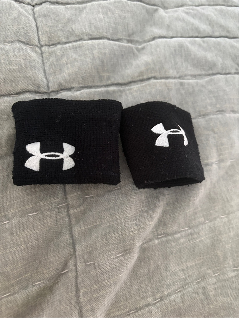 Under Armour Black Stretch Wristbands with White Logo Pair